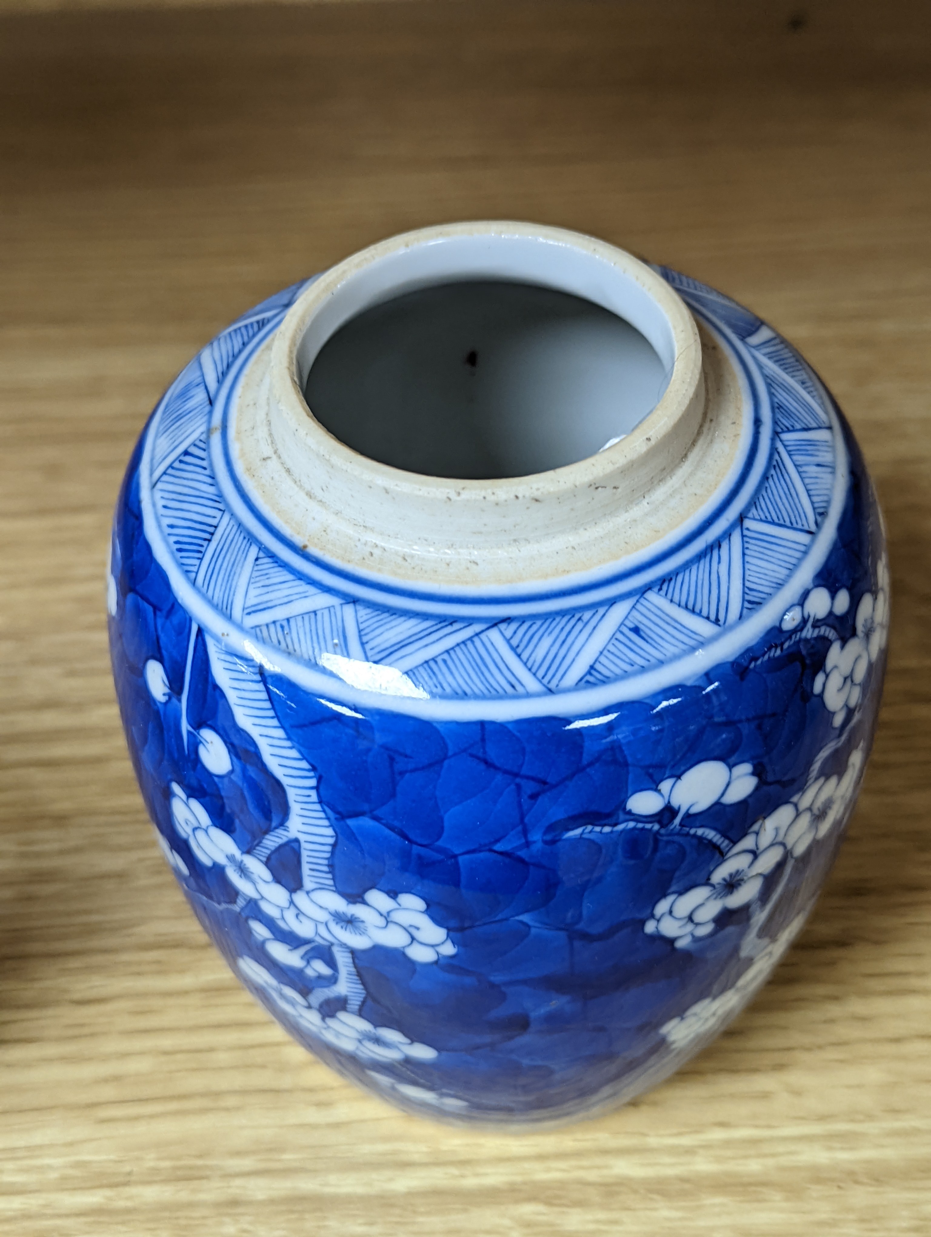 A 19th century Chinese blue and white prunus jar 13.5cm